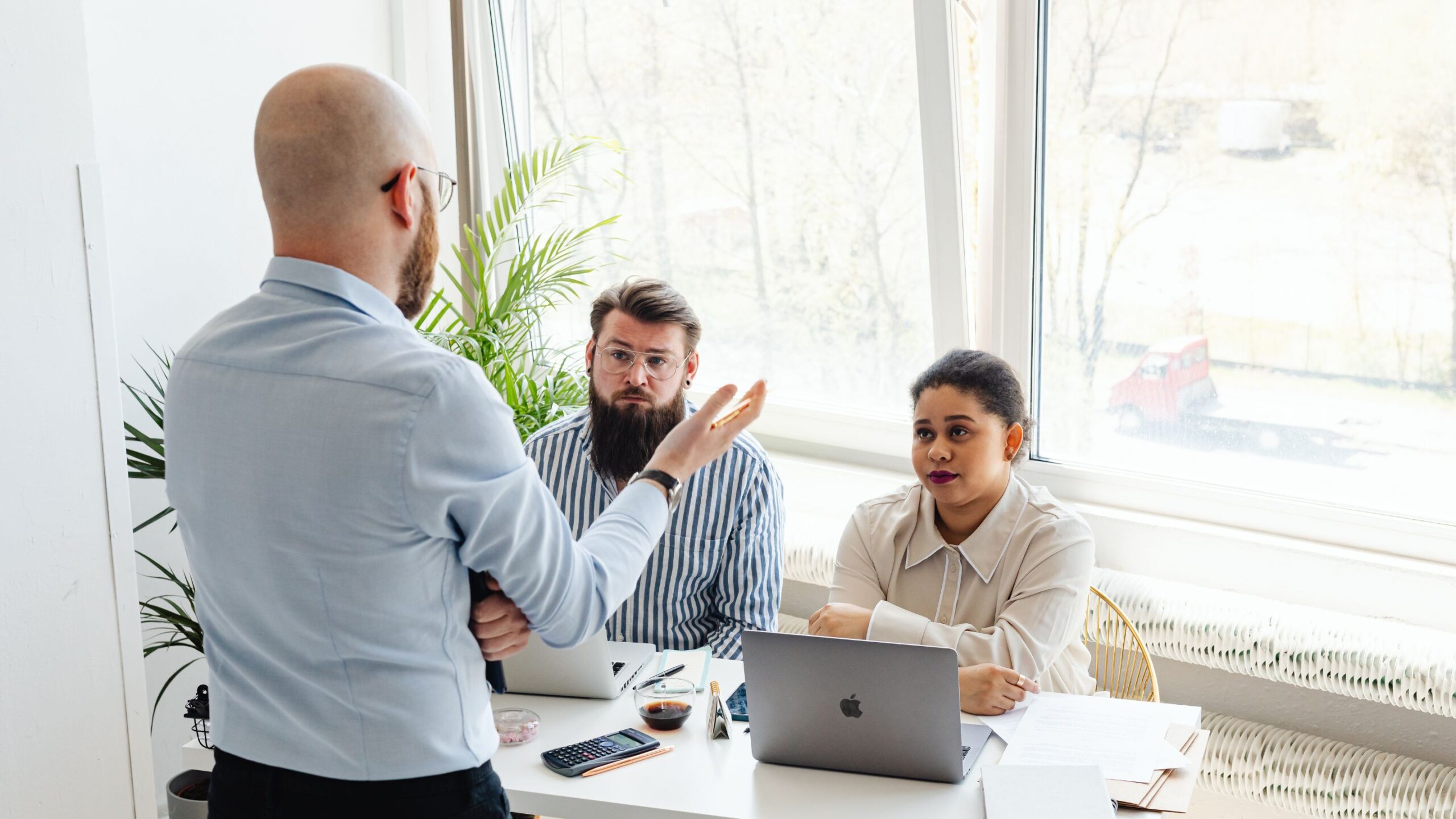 Social workers collaborating in office
